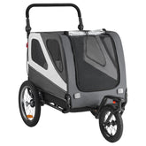 Dog bike trailer with spacious cabin, weather protection, quick release wheel, and universal bike coupler for small and large dogs up to 100 lbs.