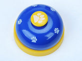 Pet training bell with non-skid base and paw print for dog and cat communication and potty training